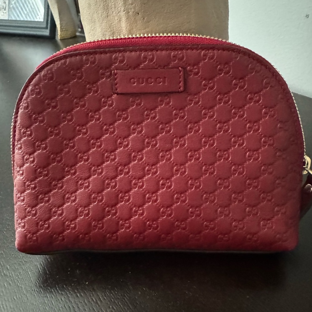 Authentic Gucci Embossed Red clutch or Cosmetic Case